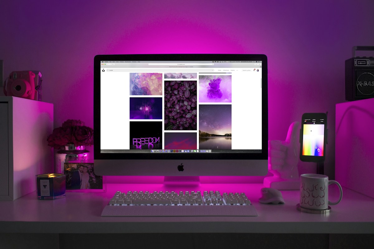 A home computer workstation with colorful lighting