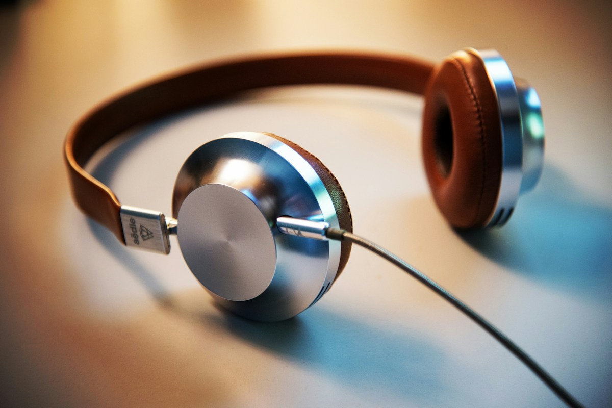 Wired headphones resting on a tabletop