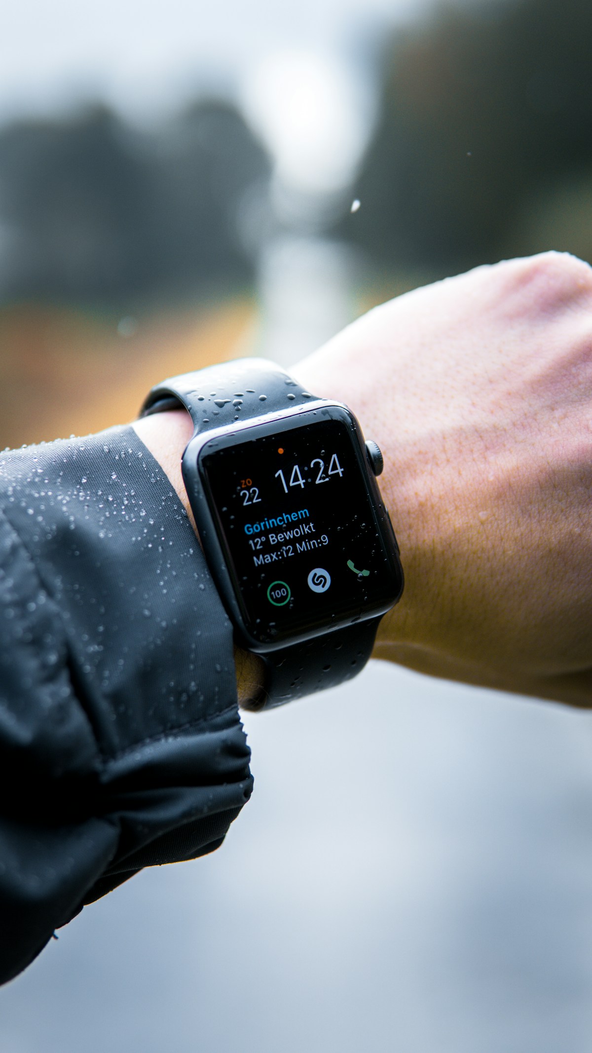 Smartwatch worn on a wrist outdoors
